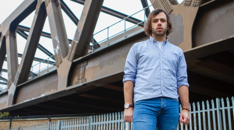 Mike Stoyanov by a bridge